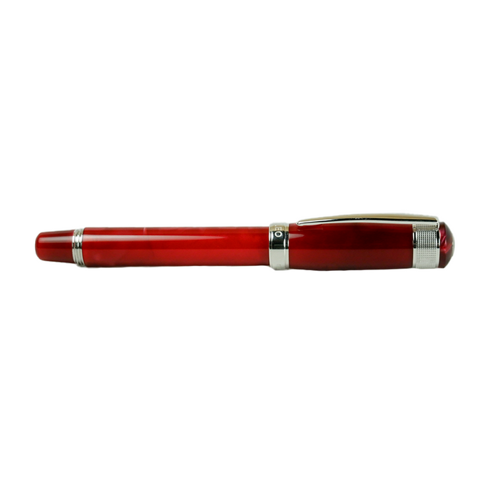 Cleo Skribent Aura fountain pen with red rollerball ink, sleek design, and elegant detailing.