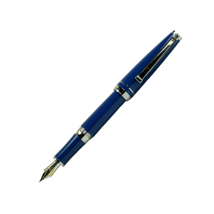 Cleo Skribent Skribent Platinum fountain pen with blue ink and elegant design, showcasing its polished metal body and fine nib.