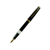 Open Cleo Skribent Classic Gold fountain pen with black barrel and gold accents, showcasing its piston filling mechanism.