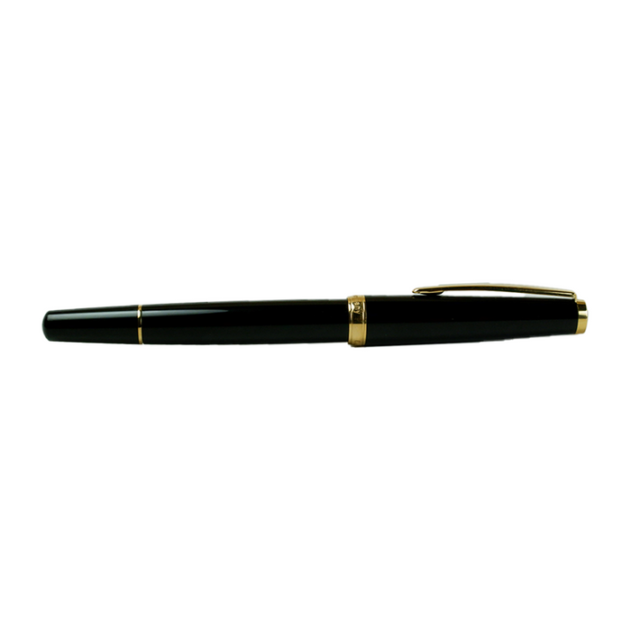 Open Cleo Skribent Classic Gold fountain pen with black barrel and gold accents, showcasing the piston filling mechanism.