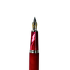 Cleo Skribent Aura fountain pen with red barrel and gold accents, elegant writing instrument on a white background.