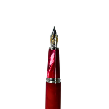 Cleo Skribent Aura fountain pen with red barrel and gold accents, elegant writing instrument on a white background.