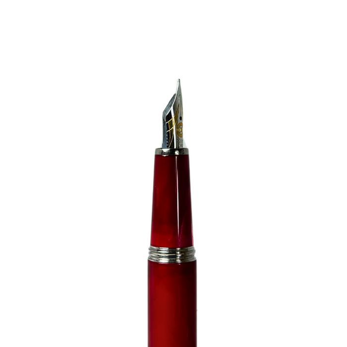 Red Cleo Skribent Aura fountain pen with gold accents, displayed on a white background.