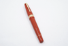 Conway Stewart Orange Duofold fountain pen with fine nib, featuring a sleek orange body and elegant design.