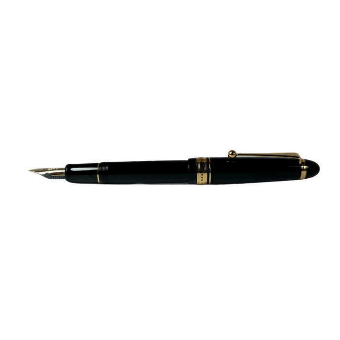 Pilot Custom 743 black fountain pen with gold accents, showcasing the sleek, elegant design and fine nib of this luxury writing instrument.