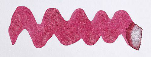 Diamine Shimmertastic Electric Pink fountain pen ink bottle with shimmering pink ink visible inside.
