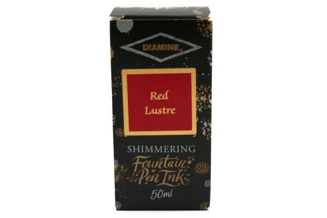 Diamine Shimmertastic red lustre fountain pen ink in a bottle, showcasing its shimmering red ink for elegant writing.