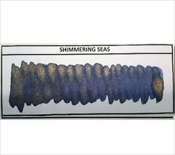 Diamine Shimmertastic Shimmering Seas fountain pen ink in a bottle with shimmering blue-green ink visible inside.