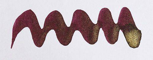 Diamine Shimmertastic fountain pen ink in Wine Divine, featuring shimmering deep red ink in a bottle with a pen.