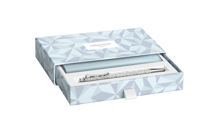 Caran D'Ache Ecridor Alpine Frost and Polar Blue leather case with two elegant ballpoint pens, detailed close-up.