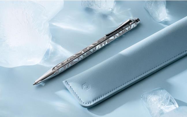 Caran D'Ache Ecridor alpine frost and polar blue ballpoint pen set with leather case, showing detailed close-up of the pens.