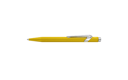 Caran D'Ache Ballpoint Pen 849 with yellow color and sleek design, featuring smooth metal barrel and signature branding.