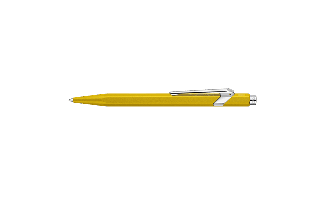 Caran D'Ache Ballpoint Pen 849 with yellow color and sleek design, featuring smooth metal barrel and signature branding.