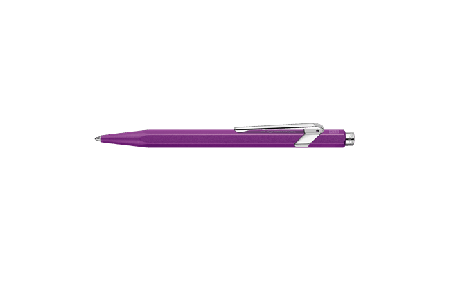 Caran D'Ache Ballpoint Pen 849 in violet with a sleek metal body and signature hexagonal design, detailed close-up image.