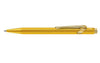 Gold Caran D'Ache Ballpoint Pen 849 with sleek design, displayed with its elegant carrying case.