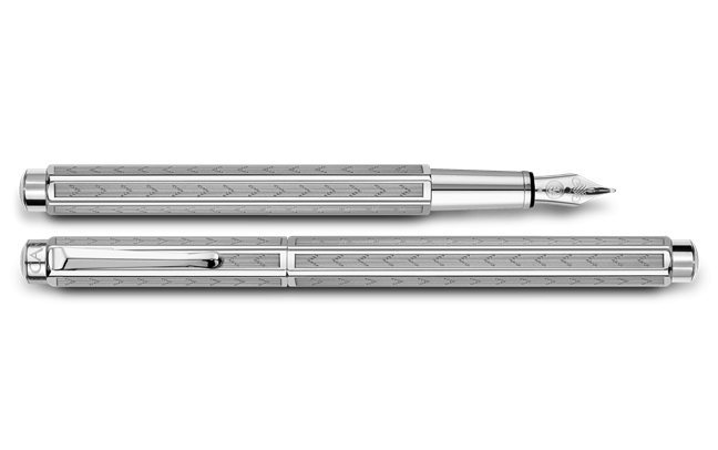 Caran D'Ache Platinum-Coated Ecridor Chevron fountain pen with detailed chevron pattern and platinum finish.