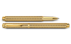 Caran D'Ache Gilded Ecridor Chevron rollerball pen with gold accents and intricate chevron pattern on the barrel.