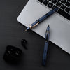 Nahvalur Eclipse fountain pen with cobalt and hepatizon finish, featuring rose gold accents and a sleek black barrel.