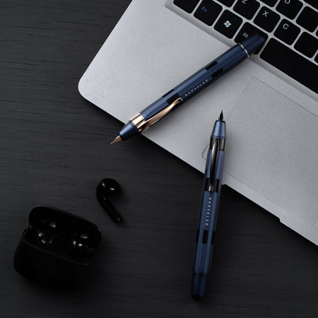 Nahvalur Eclipse fountain pen with cobalt and hepatizon finish, featuring rose gold accents and a sleek black barrel.