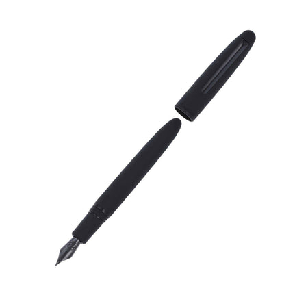Esterbrook Estie Raven fountain pen with gold accents and black lacquer finish, showcasing its elegant design and fine nib.
