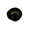 Wax seal featuring fang design by Papier Plume, showcasing intricate fang-shaped motif on a classic wax seal.