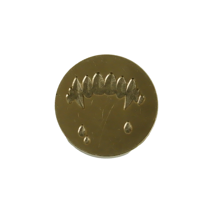 Wax seal featuring fang design from Papier Plume, showcasing a detailed, decorative stamp with a fang motif on a white background.