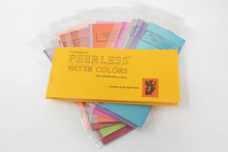 Peerless Watercolors Original 1885 Complete Edition set of vibrant watercolor paints, featuring multiple color pans on a palette.