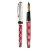 Close-up of a Grifos Fleur De Lis fountain pen with intricate gold and silver detailing on the nib.