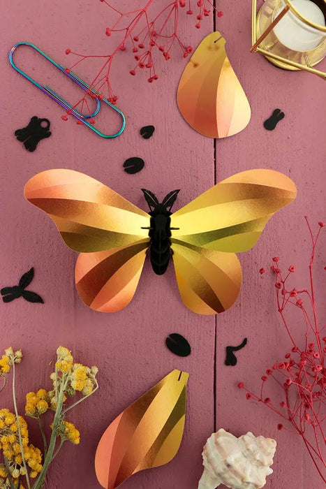 Large yellow silk butterfly craft by Assembli, featuring intricate paper and fabric details for DIY projects and decorations.