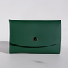 Green Papier Plume Swatch Card Holder made of regenerated leather, designed for storing and organizing fabric or swatch cards.