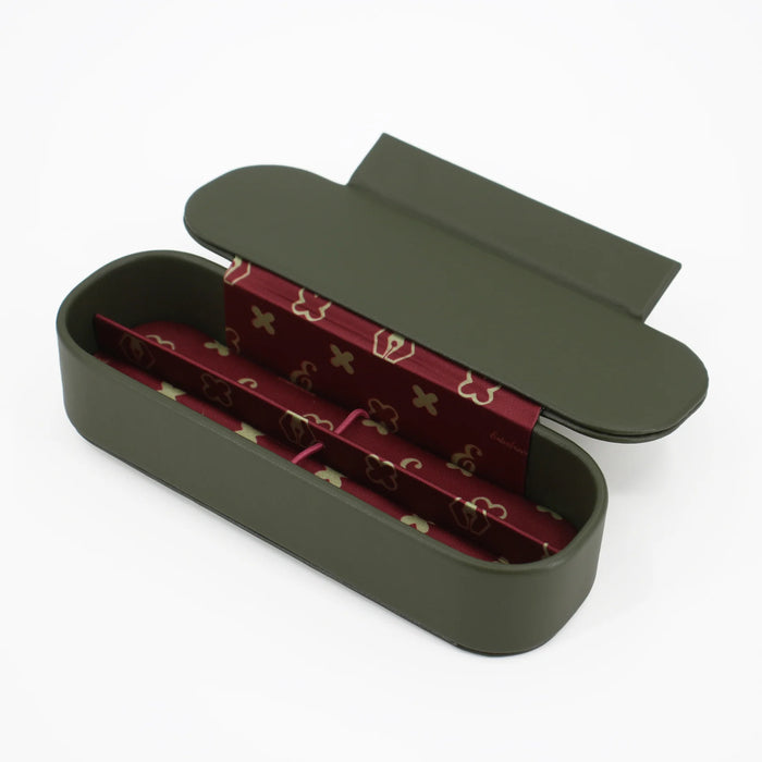 Green Esterbrook Pen Nooks double pen case with two compartments, designed to securely store and protect pens or writing instruments.