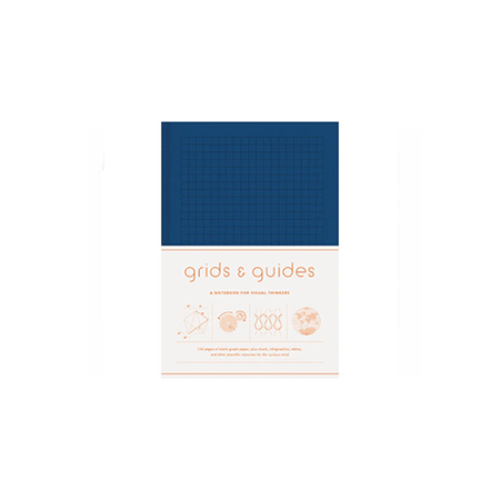 Large navy Grid & Guides journal by Princeton Architectural Press with grid pages for sketching and note-taking.