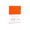 Large orange Grid & Guides journal by Princeton Architectural Press with grid pages for sketches and note-taking.