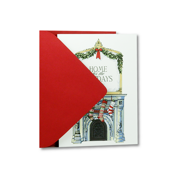 Decorative Christmas card by Scriptura featuring a festive holiday scene with "Home for the Holidays" message.