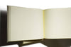 Small handcrafted Il Cartiglio guest book with off-white linen cover and elegant design, ideal for guest signatures.