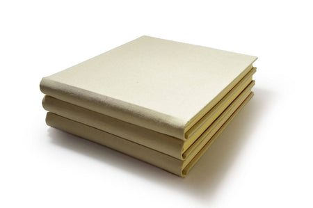 Large handcrafted Off-White Linen Guest Book by Il Cartiglio, featuring elegant writing pages for special occasions.