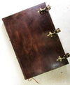 Leather bound Buckled Sketching Journal by Il Cartiglio with hard cover and leather exterior for sketching and note-taking.