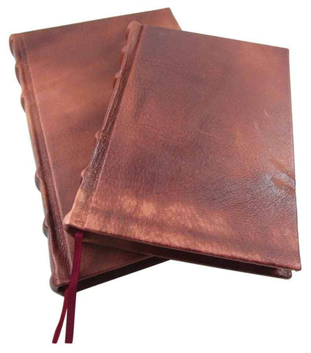 Handcrafted leather journal with old world spine, featuring blank pages and a rustic, vintage design by Il Cartiglio.