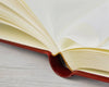 Small leather photo album by Il Cartiglio with a classic, elegant cover for storing and displaying treasured photographs.
