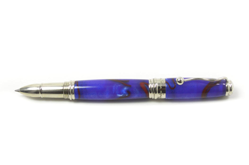 Jean-Pierre Lepine Indigo Classic Murano rollerball pen with blue and red filet, featuring a sleek design and elegant glass accents.