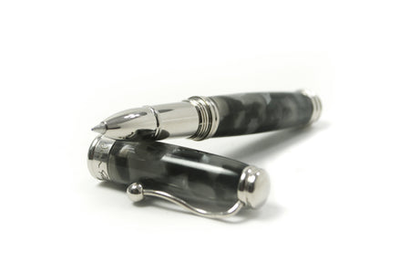 Jean-Pierre Lepine Indigo Classic Murano rollerball pen with black tortoise-patterned resin body and silver accents.
