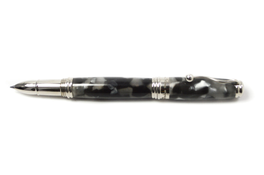 Jean-Pierre Lepine Indigo Classic Murano rollerball pen with black tortoise-patterned resin body and gold accents.