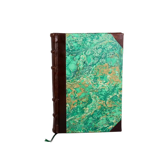 Leather journal with handcrafted leather trim and marbled paper pages, featuring an old-world spine design by Il Cartiglio.