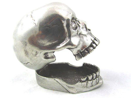 Jac Zagoory Laugh Out Loud Skull pen holder, a unique skull-shaped pen rest for desk organization and decorative display.