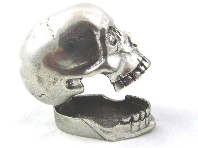 Jac Zagoory Laugh Out Loud Skull pen holder, a unique skull-shaped pen rest for desk organization and decorative display.