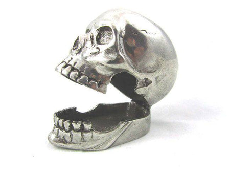 Jac Zagoory Laugh Out Loud Skull pen holder, a quirky skull-shaped pen rest for desk organization and decorative use.