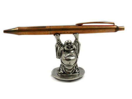Mini Happy Buddha pen holder by Jac Zagoory, a decorative pen rest featuring a cheerful Buddha figure.