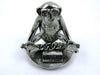 Jac Zagoory Write No Evil chained-down monkey hands mini pen holder with sculpted monkey hands as a decorative pen rest.