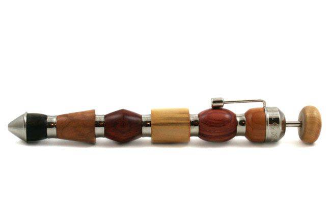 Jean-Pierre Lepine Alexis ballpoint pen with a sleek wooden barrel and gold accents, showcasing elegant craftsmanship.