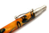 Jean-Pierre Lepine Indigo Classic Murano ballpoint pen with orange body and blue filet, featuring a sleek design.